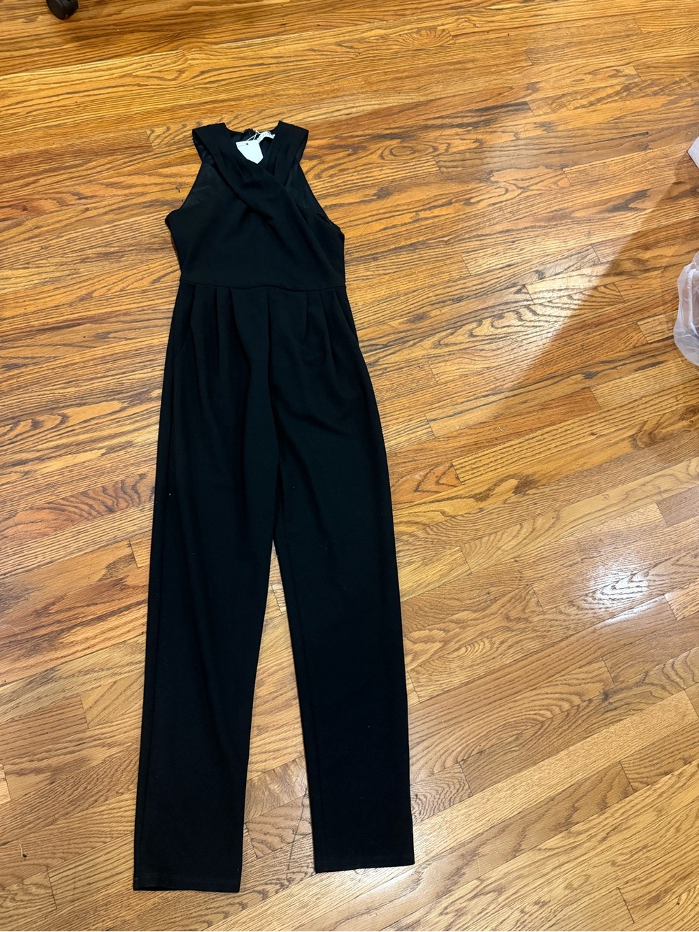 Lush Black Sleeveless Wrap-Front Jumpsuit. Perfect for girls night!